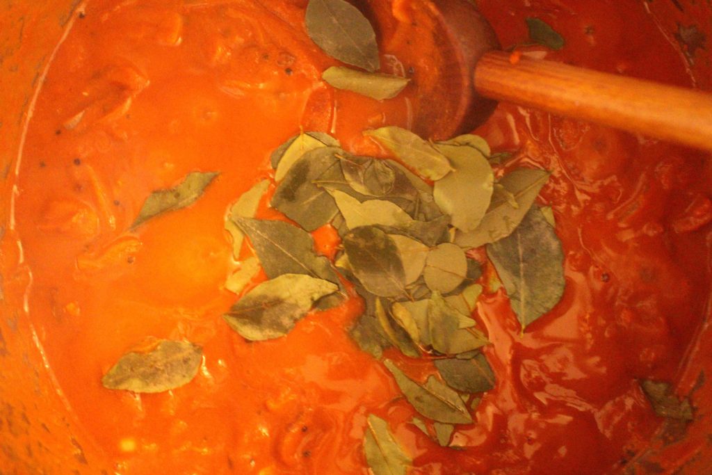 Making fish head curry